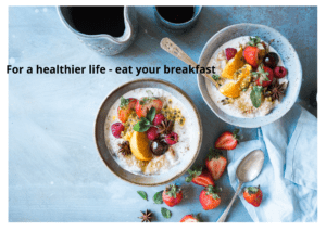 Oatmeal bowls with fruit and berries, and black coffee