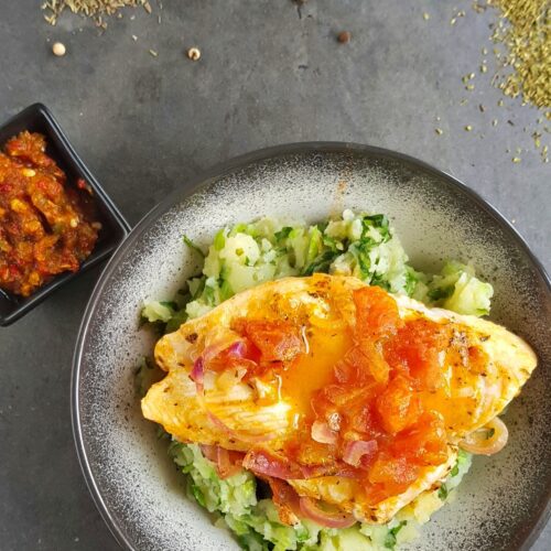 Mashed potatoes with endive and white fish, and hot sauce Adjika