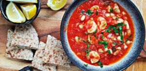 tomato stew with prawns and white beans, pitta bread, lemon