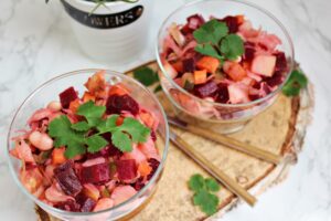 vegetable root salad with potatoes, carrots, beetroot, and sauerkraut