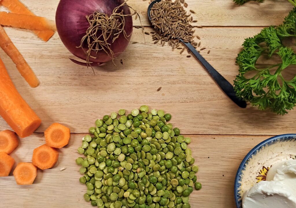 split peas, onion, carrot, fresh parsley, cumin seeds, and goat cheese