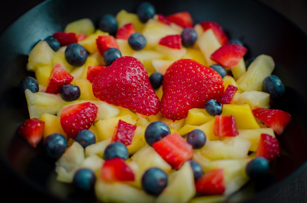 fruit salad: banana, apple, strawberry, orange