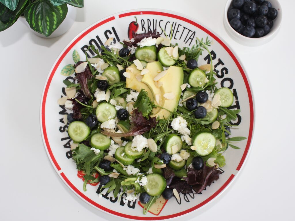 green salad with blueberries and feta cheese