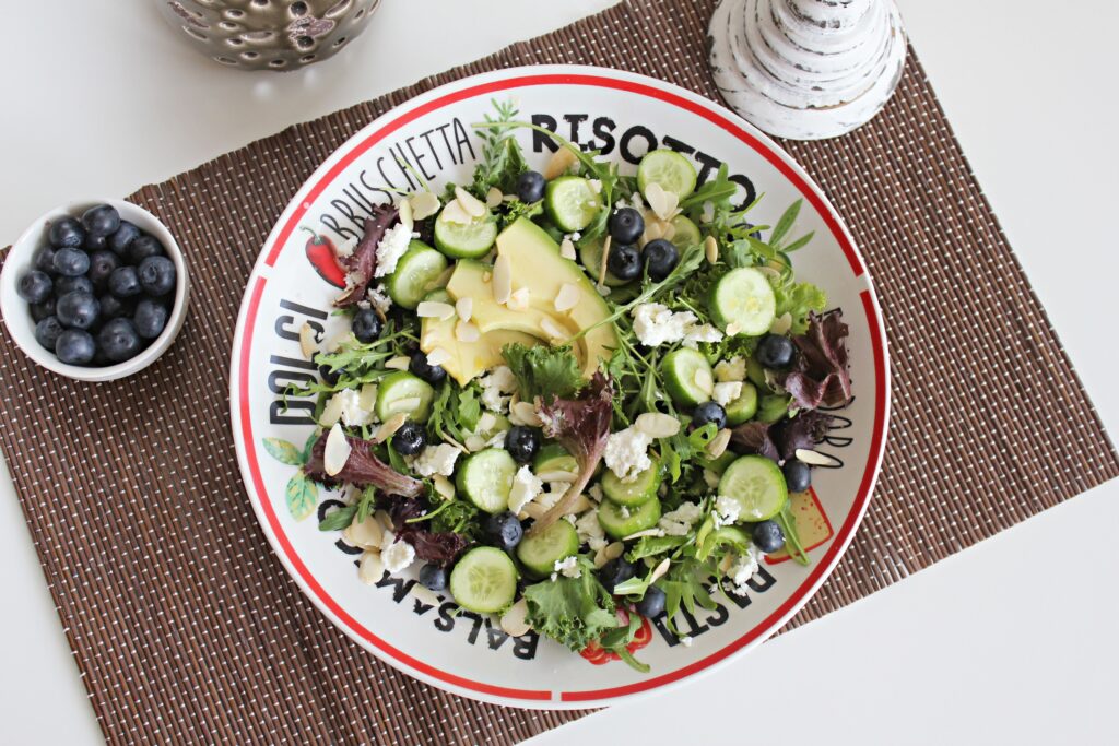 green salad with blueberries and feta cheese