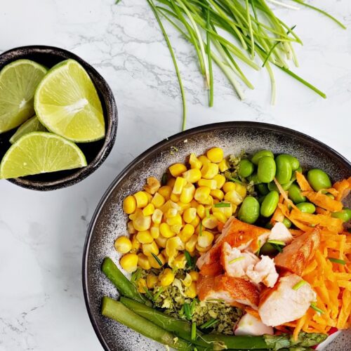 broccoli rice bowl with salmon, green asparagus, soybeans, and sweet corn