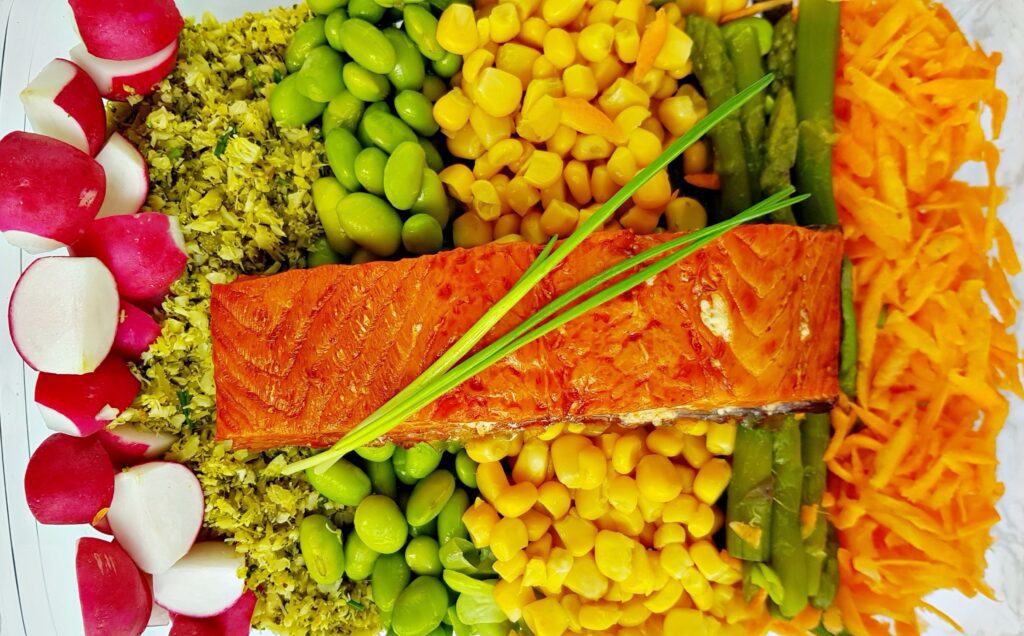 broccoli rice with salmon, green asparagus, soybeans, and sweet corn