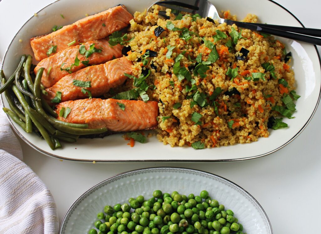 quinoa bowl with baked salmon and green beans