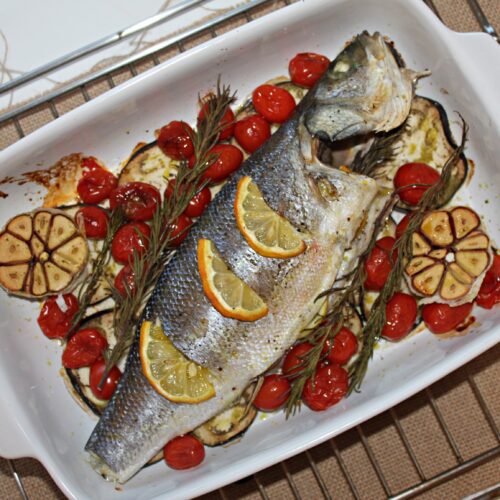 One-Pan Baked Sea Bass with garlic, eggplant and cherry tomatoes