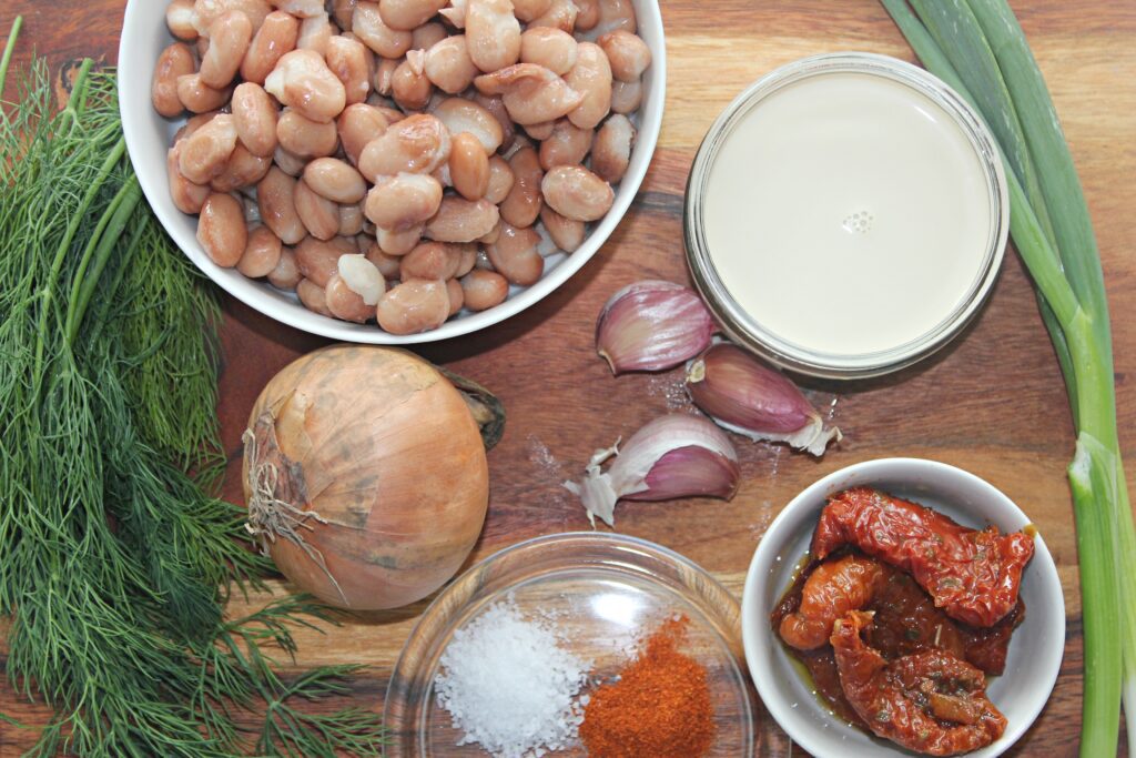 pinto beans, onion, garlic, fresh dill, green onion, oat cream, salt and pepper, sun-dried tomatoes