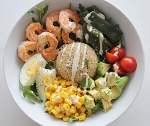 quinoa bowl with prawns, avocado and egg