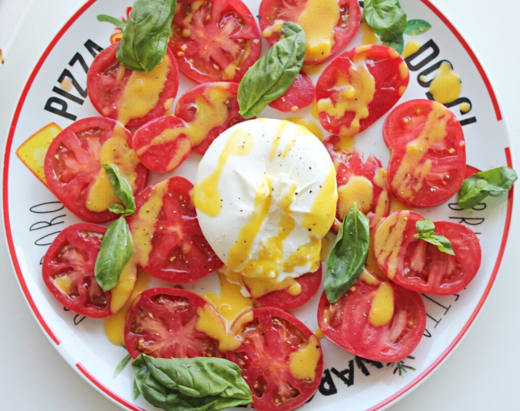tomato salad with creamy burrata and peach dressing
